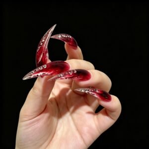 Handmade red and black flame stiletto press-on nails with extra-long shape