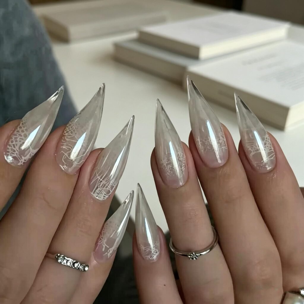 Long white chrome stiletto press-on nails with glossy pearl finish and luxury design