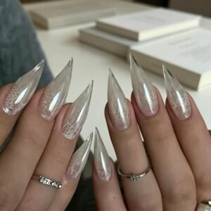 Long white chrome stiletto press-on nails with glossy pearl finish and luxury design